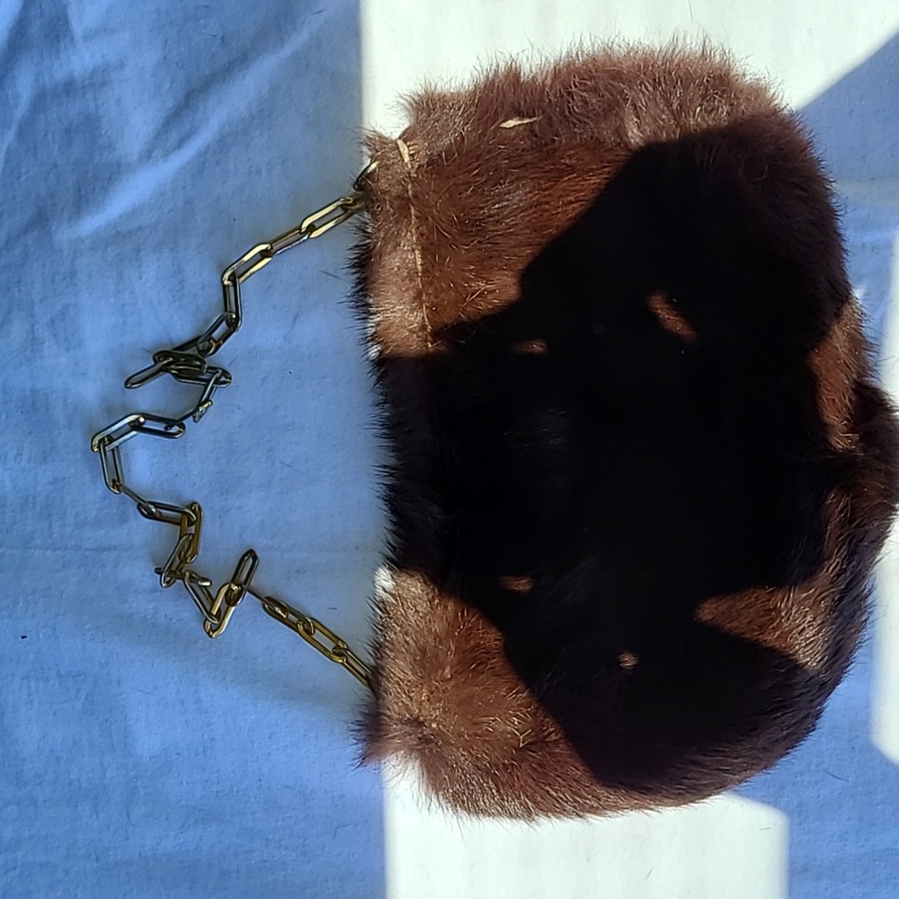 The Limited Brown Fur Purse is so cute for the winter time, wear it with a fur!